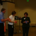 Incoming President Tom Kipp & Incoming President-Elect Juli Pickering Presenting a Gift to Jean Frederick